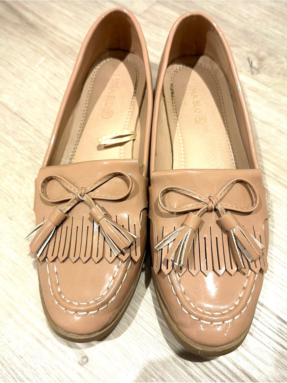 Patent Tassel Kiltie Loafers in Nude